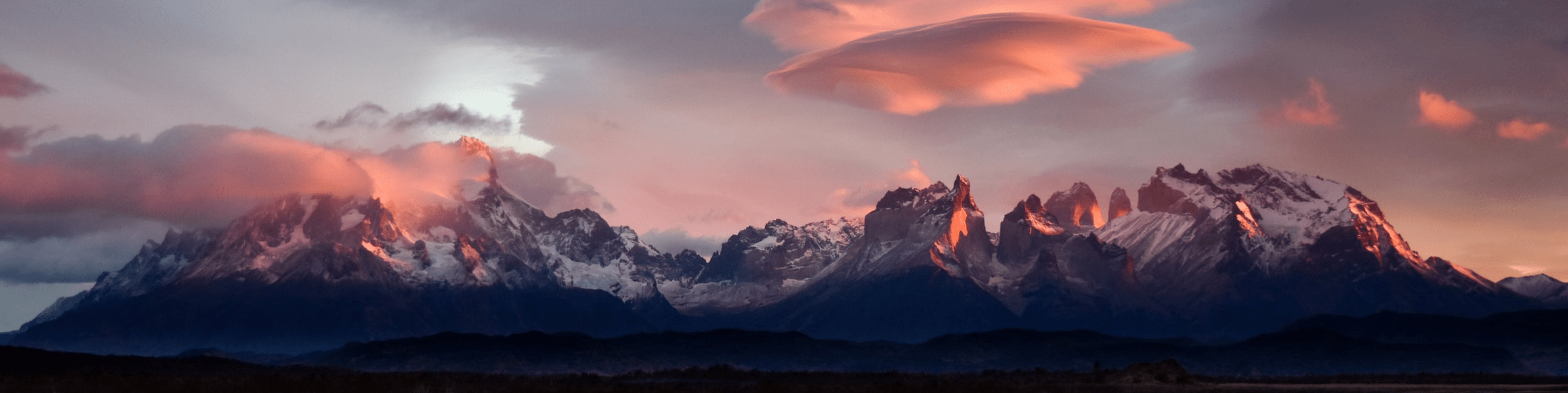 A mountain range at sunset